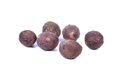 Thai herb name Myristica fragrans Houtt. or Nutmeg seeds isolated on white background