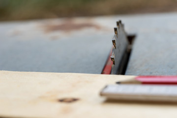 Circular saw with pencil and folding rule to measure