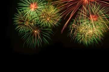 Fototapeta premium Colorful fireworks celebration and the night sky background.