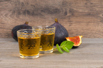 figs vodka and fresh fruits with mint leaves
