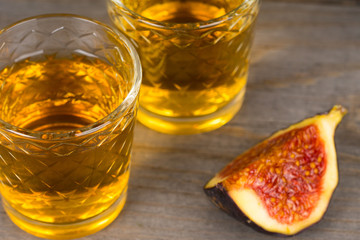 homemade wine and fresh fig fruits closeup shot