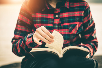 Fototapeta premium Women read books in quiet nature, concept read a books.