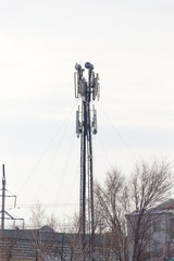 telecommunication tower with antenna at blue sky