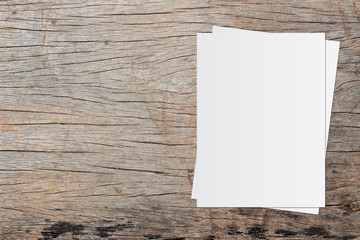 White paper and space for text on old wooden background