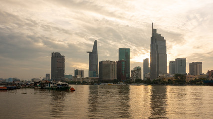 Fototapeta na wymiar Beautiful landscape sunset of Ho Chi Minh city or Sai Gon, Vietnam. Royalty high-quality free stock image of Ho Chi Minh City with skyscraper buildings. Ho Chi Minh city is the biggest city in Vietnam