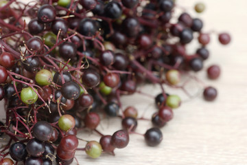 elderberries lying on wood