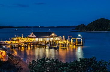 Paihia wharf in Bay of Islands, Far North District, Northland, New Zealand, at night