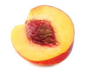 Nectarine with slices isolated on white background.