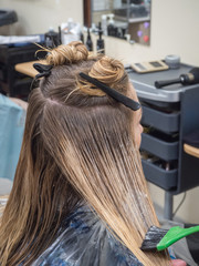 Restoration of damaged hair with innovative materials.