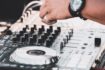 Dj mixing at  beach party in summer