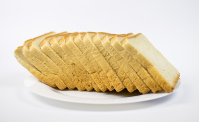 Toast bread on a white plate.