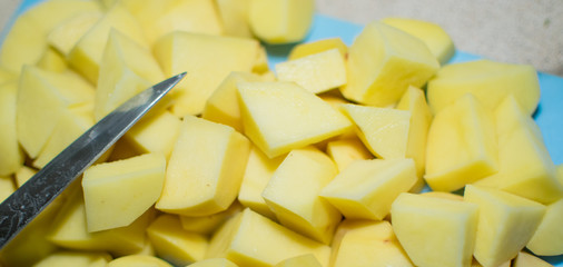Sliced raw potatoes.