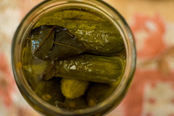 Canned cucumbers in a jar.