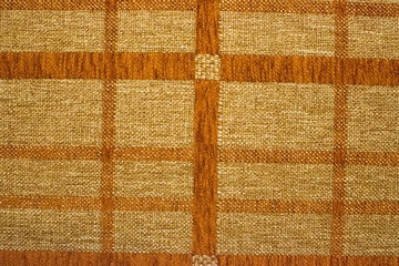Background of fabric in brown stripes.
