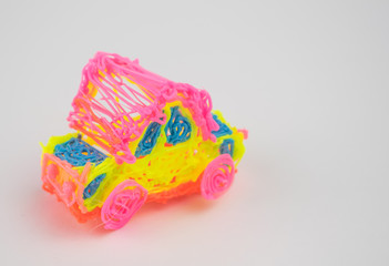  a toy car made with a 3d pen  on a white background.