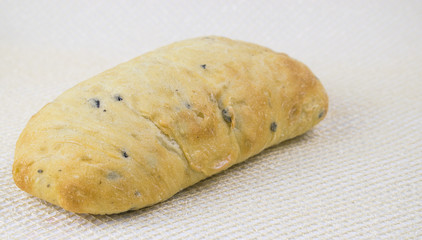 Homemade bread - ciabatta on a light background.