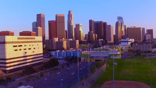 Down Town Los Angeles CA Aerial View From Helicopter and Drone sun set 