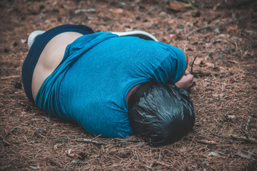 corpse of a man in the woods