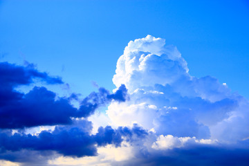 Naklejka na ściany i meble Big white cloud on blue sky. Heaven view