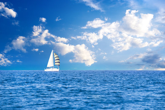 Sailing. Ship yachts with white sails in the open Sea. Concept sea travel, trip.