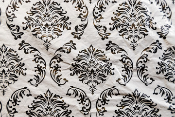 Texture pattern on old oilcloth. Black picture on white background