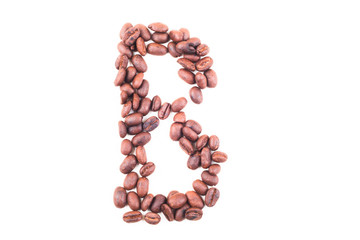 The alphabet B from roasted coffee beans. Isolated. White background.