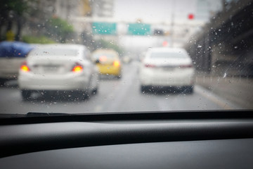 Driving from the driver's perspective in the rain.