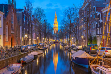 Naklejka premium View of Zuiderkerk church at night in Amsterdam city, Netherlands