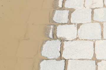 Grey Old Stone Pavement Top View or Granite Cobblestone Road
