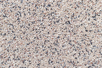 Decorative acrylic mosaic plaster texture on wall outside