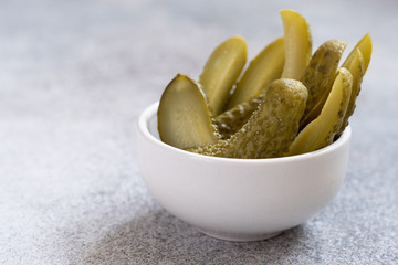 Pickles. Bowl of pickled cucumbers