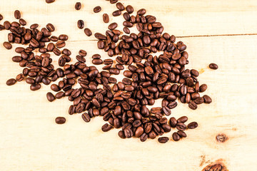 coffee beans on wooden background