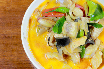 Spicy Tom Yum Soup in white blow with herb, a spicy clear soup typical in Thailand and No.1 Thai Dish Cuisine, hot and sour soup. Popular Thai Cuisine, Traditional food cuisine in Thailand,