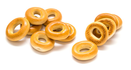Small bagels, small rolls on a white background.
