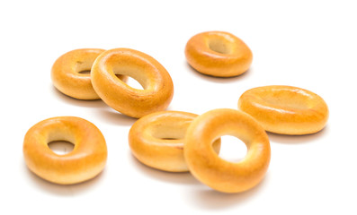 Small bagels, small rolls on a white background.