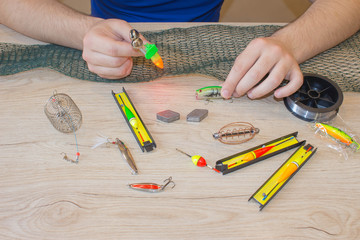 bait, wobbler and fishing accessories on the table