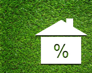 Interest Rate Symbol on Grass Background