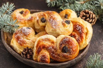 Traditional Swedish Christmas saffron buns (lussebulle or lussekatt). Swedish christmas.