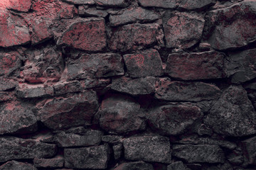 close-up view of old weathered stone wall textured background