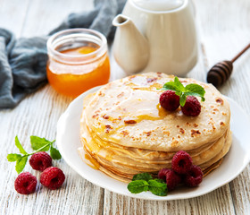 Delicious pancakes with raspberries
