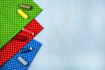 Coils with threads and multi-colored fabrics