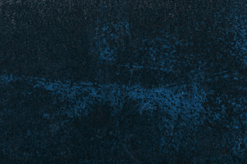 dark blue aged rusty metal textured background