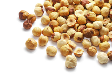 Hazelnuts roasted peeled isolated on white