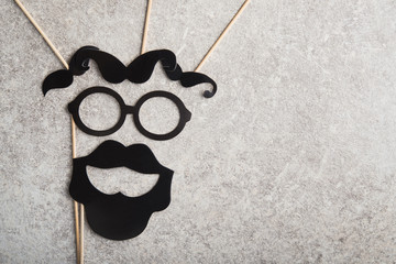 funny faces formed from black photo boots, mustache and glasses