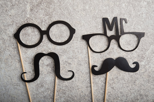 funny faces formed from black photo boots, mustache and glasses