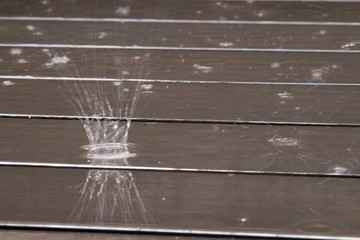 Drop, raining on the floor.