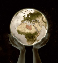 Libya on globe win hands