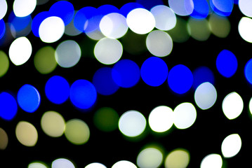 Colourful bokeh on the dark background