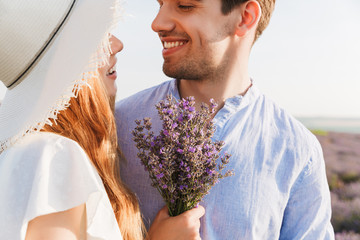 Close up of cheerful young couple embracing © Drobot Dean