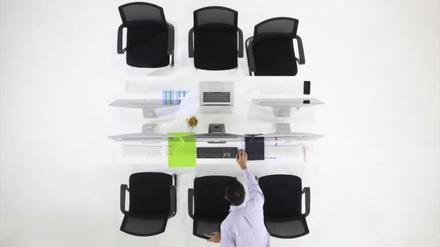 Time-lapse video of one man woking alone in office with many computers, do everything with one person, concept for work hard and multi-tasking